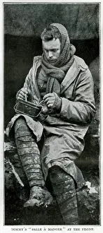 Puttees: British soldier eating rations at the Front, WW1