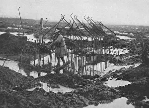 Deplorable: British soldier examing framework of pill-box, WW1