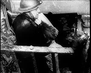 Guiding: British Soldier Guiding People Into An Underground