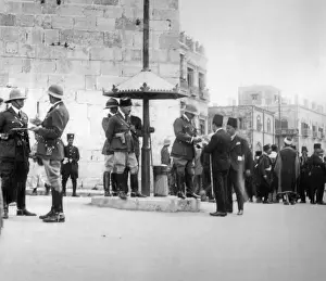 Improvised: British soldiers at an Arab procession through Jerusalem