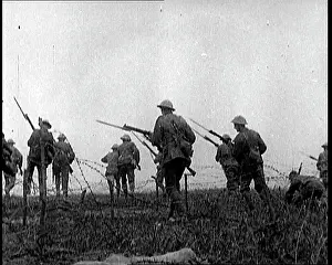Fences: British Soldiers Climbing Over and Under Barbed