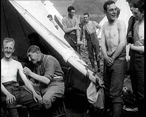 Tattoos: British Soldiers Getting Tattoos Done in a Tent