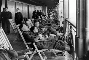 Stationed: British soldiers relaxing on deck, 1940