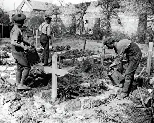 Tend: British soldiers tending graves, Western Front, WW1