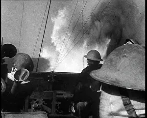 Explosions: British Soldiers Watching Explosions From the Sea