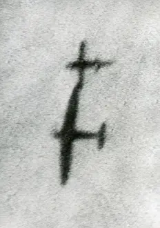 Drones: British Spitfire flies beside a V-1, attempting
