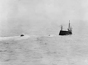Submerge: British submarine submerging, WW1