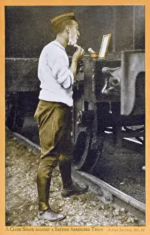 Propped: British Tommy shaves against armoured train - WWI