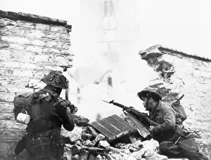 Cautiously: BRITISH TROOPS ADVANCE