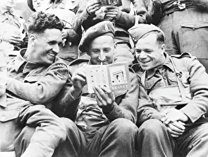 Landings: British troops reading French guide