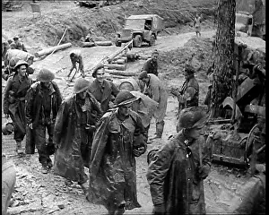 Trudging: British Troops Trudging Through a Muddy Camp
