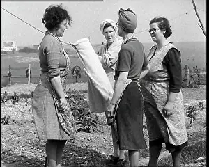 Aprons: Four British Women Wearing Aprons and Talking