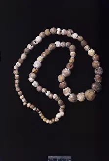 Anthropological: Bronze Age necklace made of Porosphaera
