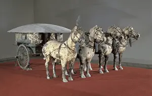 Coachs: Bronze chariot drawn by four horses. 3rd BC