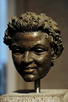 Legendary: Bronze head from the statue of a satyr. About 100 BC