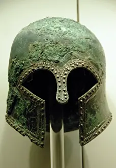 Protect: Bronze helmet of Corinthian style. 6th century B.C. Olympia