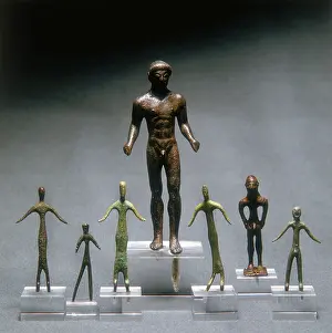 Statuettes: Bronze statuettes housed in The