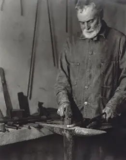 Lcgr1308: Brother Ricardo Belden blacksmithing, at the Hancock