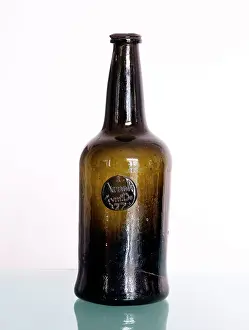 Receptacles: Brown glass bottle