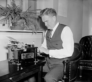 Adman: Bruce Barton at a typewriter, possibly when the