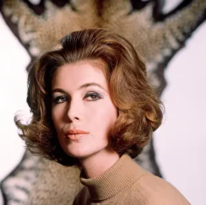 Coiffured: Brunette model with animal skin