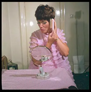 Emberton: BRUSHING HAIR