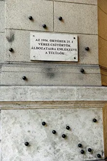 Placard: Budapest. Steel balls on the facade of the Ethnographic Muse