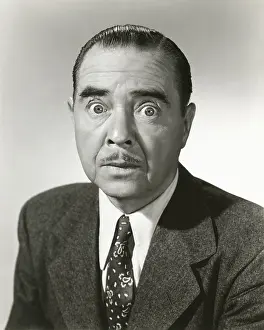 Slicked: Bug eyed man -