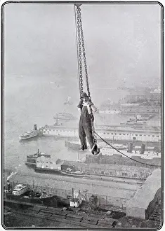 Scraper: Builder being hoisted up to Giddy Heights 1911