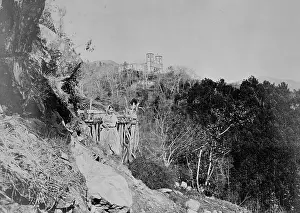 Mountainside: Buildings and figures on mountainside