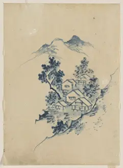 Nestled: Buildings nestled among trees in a mountain valley