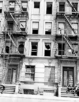 Stoop: A burned out apartment building in Harlem, ?