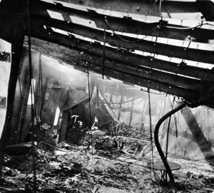 Smouldering: In the burnt out liner, Morro Castle, the deck still smoulde