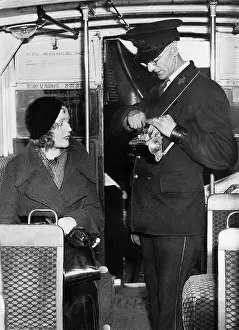 Tickets: Bus conductor in London, 1933
