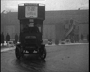Skid: Bus Being Driven At Speed Across a Skid Pan