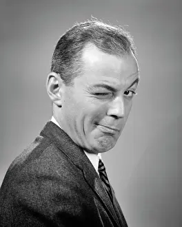 Wink: Business Man Winking Eye Trick