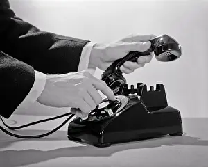 Dialing: Businessman Hands Dialing
