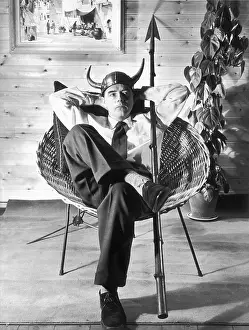 Relaxes: Businessman relaxes in his office
