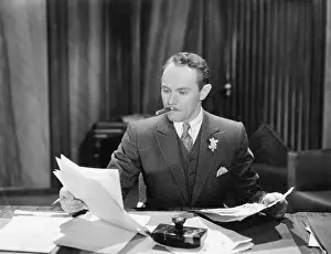 Executives: Businessman working at desk