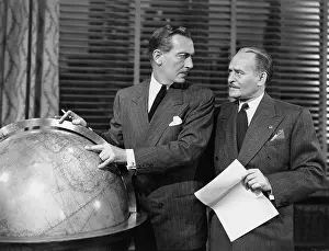 Strategies: Businessmen with globe