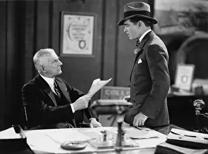 Explanations: Two businessmen in the office