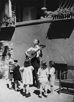 Busker: Busker in Vienna. 16th June 1948