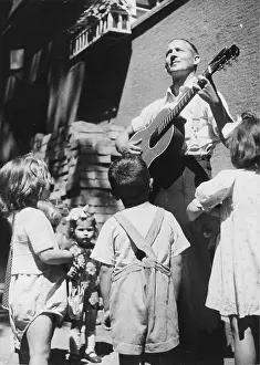 Busker: Busker in Vienna. 16th June 1948