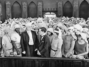 Chances: Buster Keaton (center) in Seven Chances, 1925