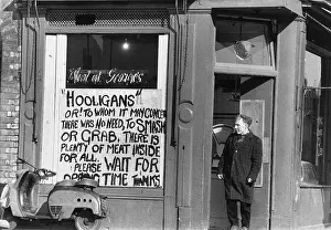 Polite: Butcher with sign to hooligans - Manchester 1966