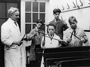Sharpening: Butcher trainees beveling knifes