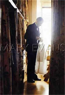Manservant: BUTLER SORTS CLOTHES