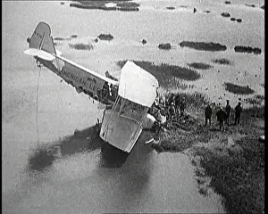 Bystanders: Bystanders Looking at the Wreckage of The