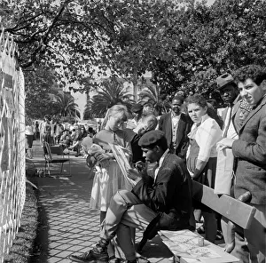 Succesful: Bystanders watch artists at work