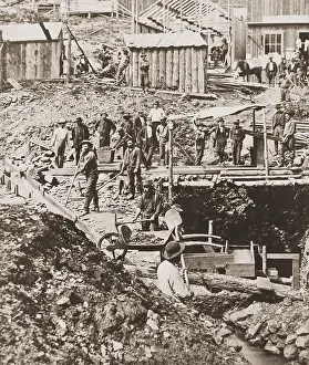 Lcgr2001: Bystanders watch as crew drifting mining for